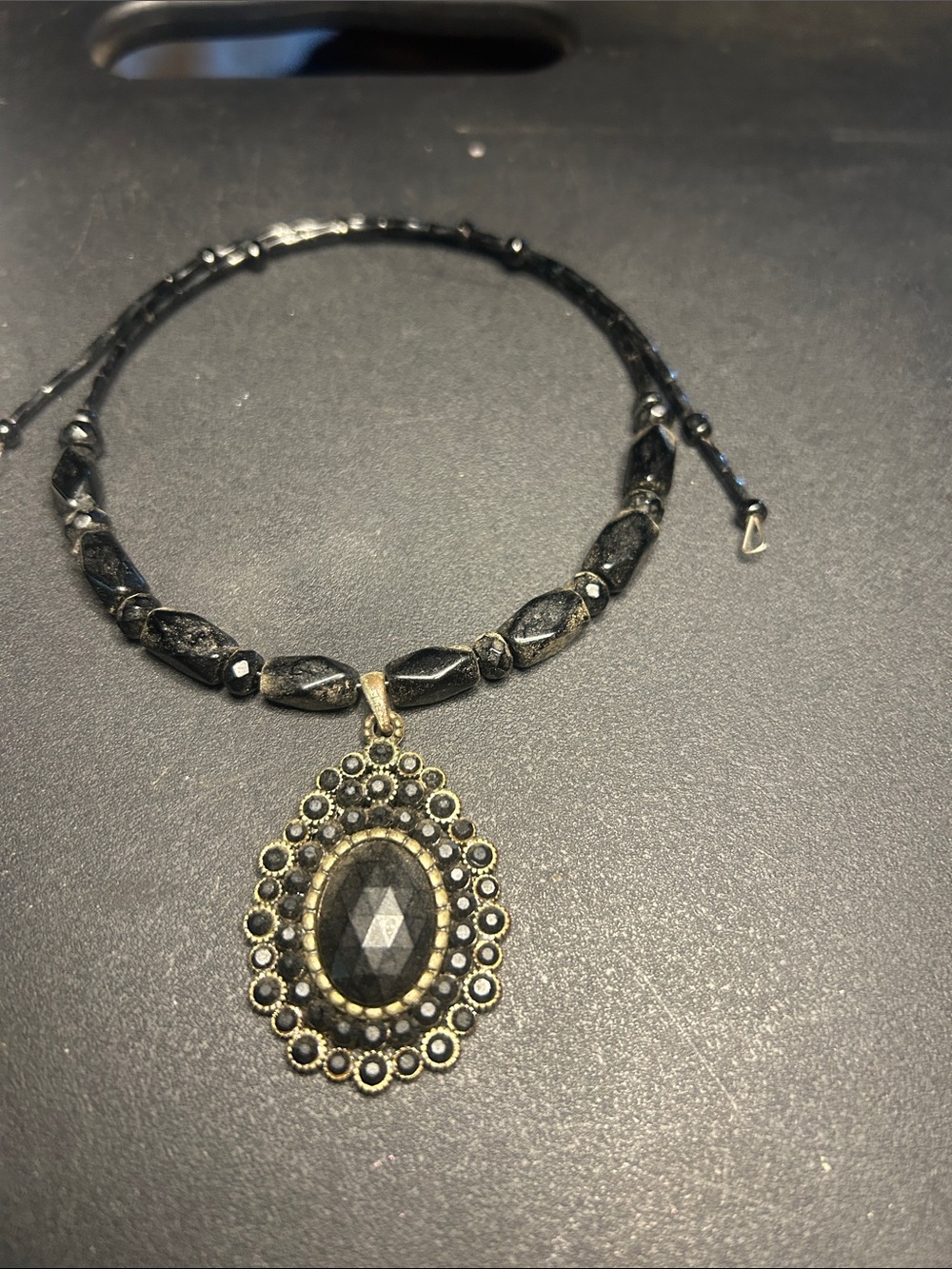 Black Stone Pendant Necklace with Antique Gold Accent